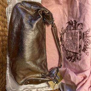 Brand New Juicy Couture purse with tags.